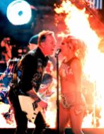 James Hetfield and Lady Gaga sharing a microphone